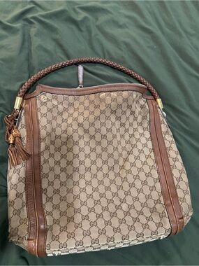 Gucci Beige GG Canvas Bella Brown Tassel Leather Braided Handle Shoulder Bag.
